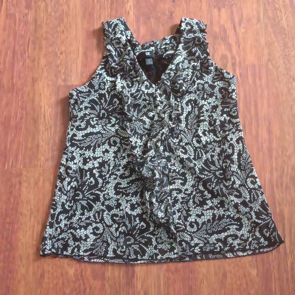 Ruffled sleeveless blouse